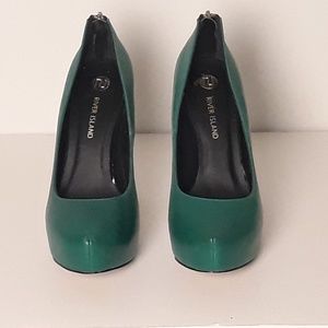Green genuine leather heels with a platform toe.
